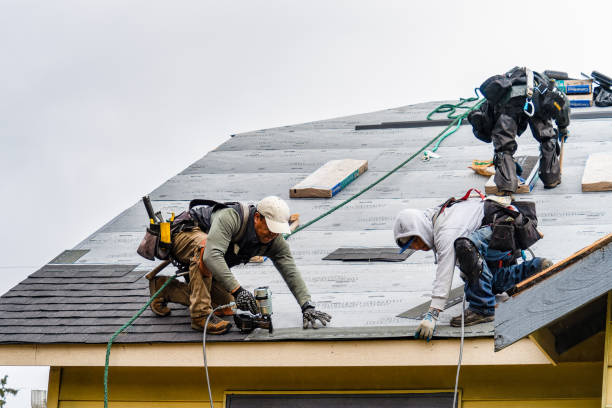 Professional Gutter Installation technician working in La Honda, CA